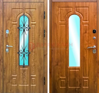 Входная дверь со стеклом и ковкой ДСК-54 для частного дома в Балашихе