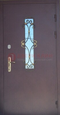 Металлическая дверь со стеклом и ковкой ДСК-77 в Балашихе